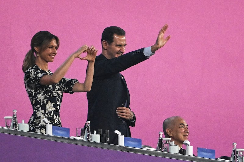 Syria's president Bashar al-Assad and his wife Asma al-Assad at the opening ceremony of the 2022 Asian Games in Hangzhou, China. Photograph: Philip Fong/AFP via Getty Images