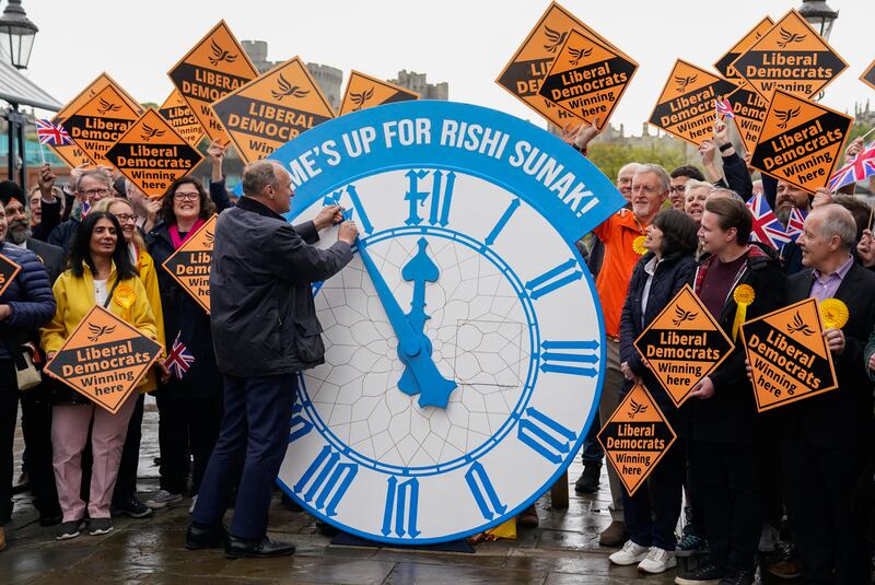 Liberal Democrats leader Ed Davey and party activists celebrate their successful local elections campaign in May this year. Photograph: Andrew Matthews/PA