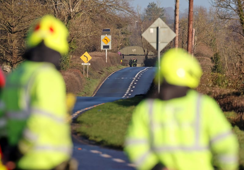 Gardaí and firefighters at the scene of the fatal car crash on the N80, south of Carlow Photograph: Colin Keegan/Collins 