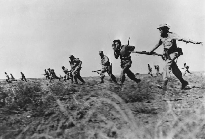 Israeli infantry attack Egyptian forces in the Negev area of Israel in 1948.  Photograph: Keystone/Getty Images