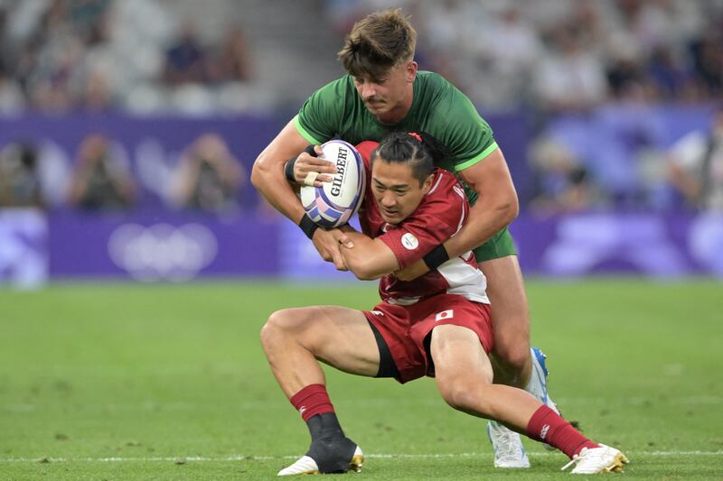 Ireland's Chay Mullins tackles Japan's Taiga Ishida. Photograph: Carl de Souza/AFP via Getty