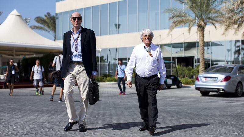 Bernie Ecclestone of Formula One with Donald MacKenzie of CVC Partners in Abu Dhabi in 2014. Photo: Peter J Fox/Getty Images