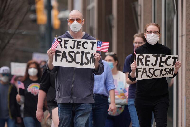 Demonstrators march in downtown Atlanta, US (Mike Stewart/AP)