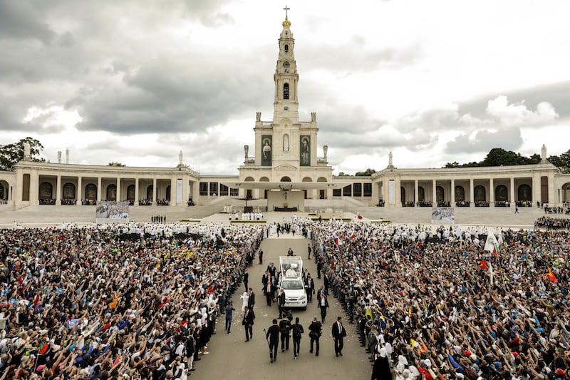 Pope Francis in his popemobile. Photograph: Paulo Novais/Pool Photo via AP