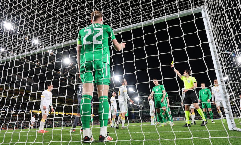 Ireland's Nathan Collins is yellow carded. Photograph: James Crombie/Inpho