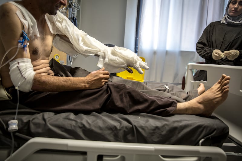 A member of the civil defence first responders is treated for his injuries after he was the victim of what he says was a 'double tap' Israeli strike. Photograph: Sally Hayden