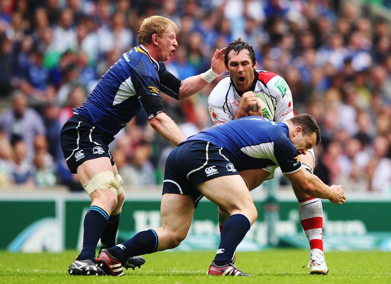 Pedrie Wannenburg of Ulster is tackled by Leinster's Leo Cullen and Cian Healy during the Heineken Cup final at Twickenham in May 2012. Photograph: Warren Little/Getty Images