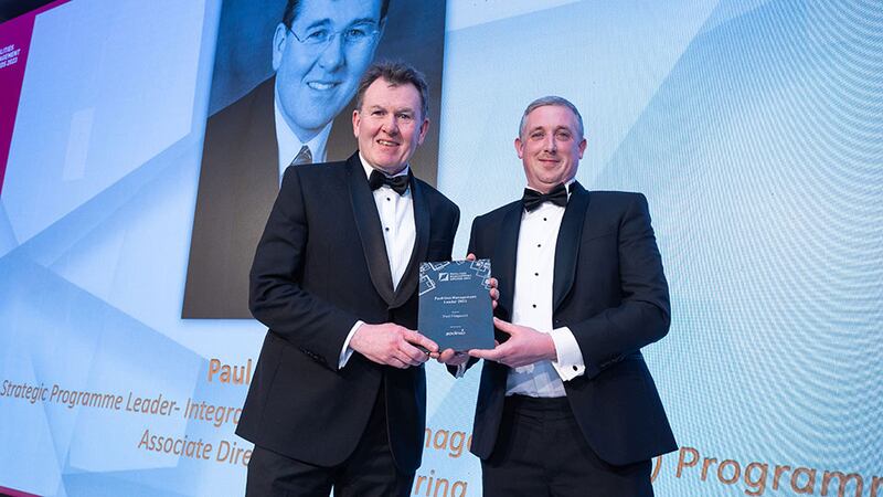 David Fox, managing director at Sodexo Ireland, presents the Facilities Management Leader award to Paul Fitzgerald