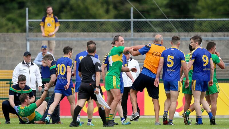 Roscommon and Donegal players scuffle at half-time during the 2018 All-Ireland Super 8 match at Dr Hyde Park. Photograph: Tommy Dickson/Inpho