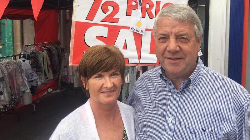 Cradle Care children’s clothing shop proprietor Bill Petrie and assistant Elisabeth McGowan