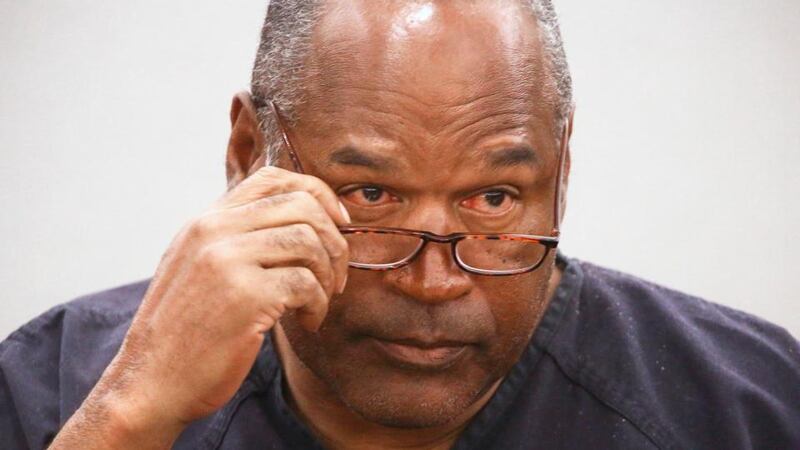 OJ Simpson takes his glasses off during his evidentiary hearing testimony. Photograph: Reuters/Jeff Scheid