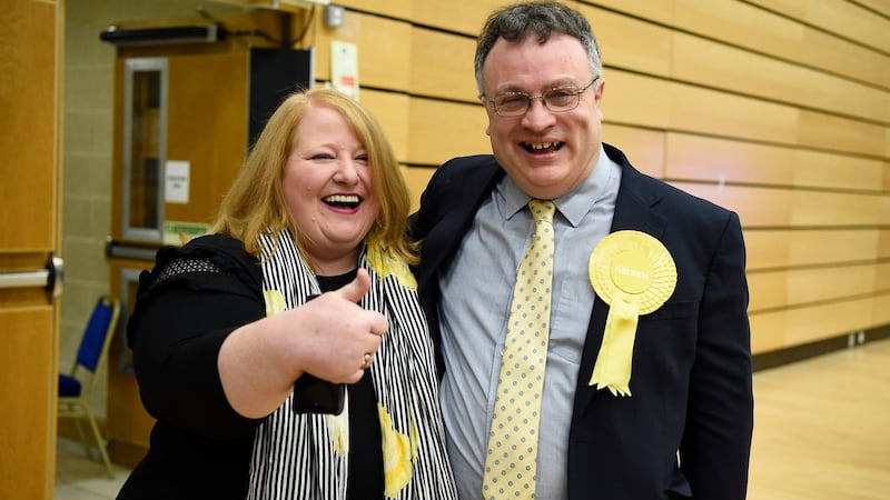 Naomi Long and Stephen Farry of the Alliance Party celebrate after Mr Farry won the North Down seat in the Westminster election. Photograph: Michael Cooper/PA