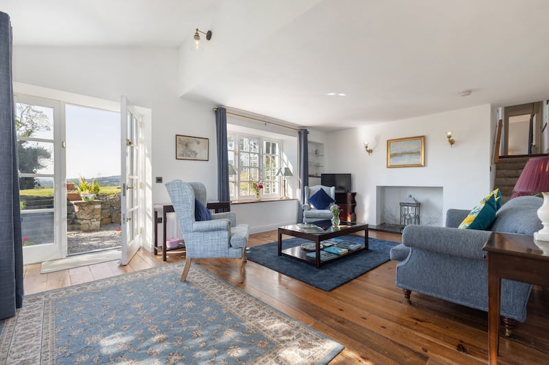 French doors lead from the livingroom to a sun terrace