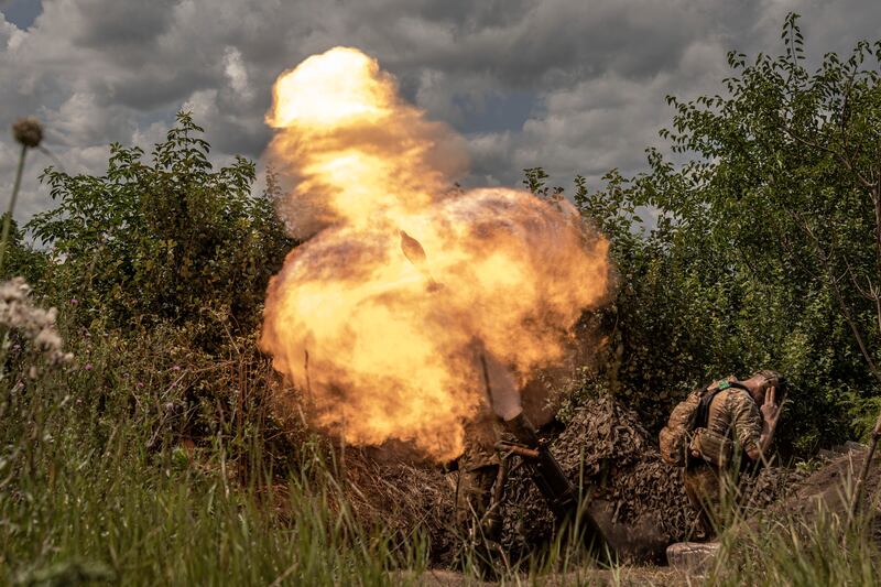 The 24th Mechanised Brigade fire on a Russian trench positions in the Donetsk region. Photograph: Finbarr O’Reilly/The New York Times
                      