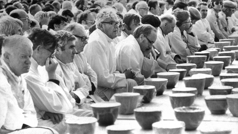 Priests wait to distribute Holy Communion. Photograph: The Irish Times