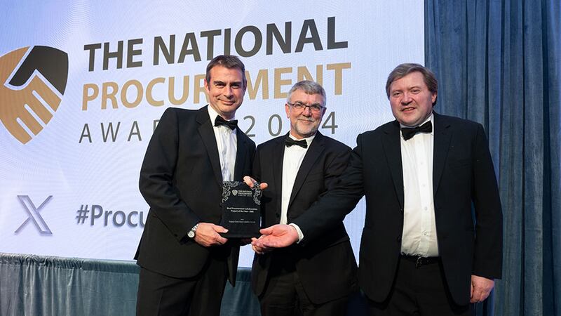 Dr Colum Foley, awards judge, presents the best procurement collaboration project of the year - SME to Andrew Wilson and Padraig Twomey, Supply Chain Sustainability School