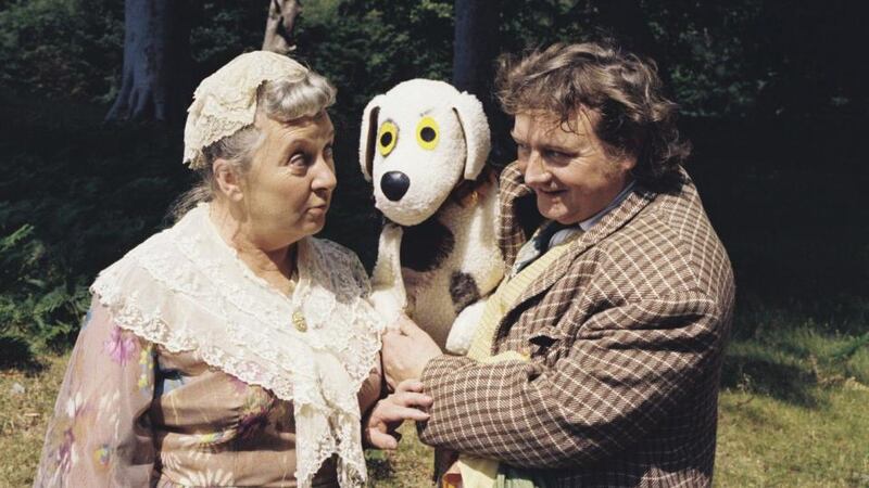 A shot from Wanderly Wagon taken in 1977:  Nora O’Mahony as Godmother, Judge the Dog and puppeteer Eugene Lambert as O’Brien. The show ran on RTÉ Television from 1967 to 1982.