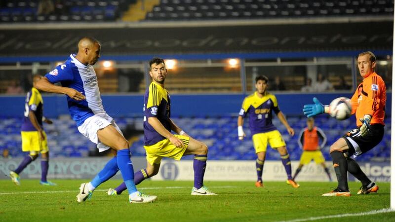 Birmingham City’s Matt Green (left) scores his sides second against   Swansea City at St Andrews. Photograph: Nigel French/PA Wire