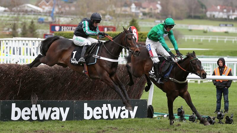 Altior ridden by Nico de Boinville (left) comes over the last on their way to victory in the Betway Queen Mother Champion Chase during Ladies Day of the 2019 Cheltenham Festival at Cheltenham Racecourse. Photo: Nigel French/PA Wire