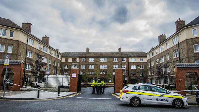 Gardaí outside Avondale House on Cumberland Street in Dublin following the murder of Gareth Hutch in May 2016. Photograph: Brenda Fitzsimons