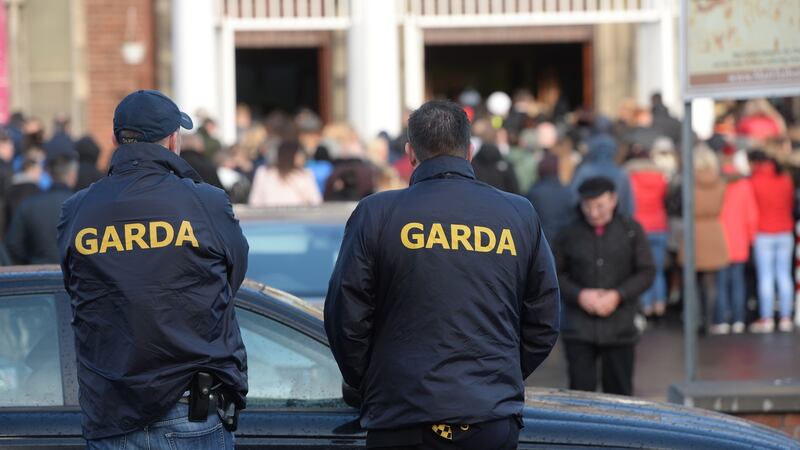 Gardaí monitor the funeral of Derek Coakley-Hutch at Sean McDermott Street. Photograph: Alan Betson