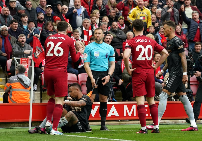 Robertson appeals to assistant referee Constantine Hatzidakis during the match at Anfield, Liverpool. Photograph: Nick Potts/PA