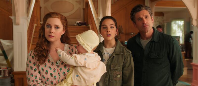 Disenchanted: Amy Adams with Gabriella Baldacchino, as Morgan, and Patrick Dempsey. Photograph: Disney