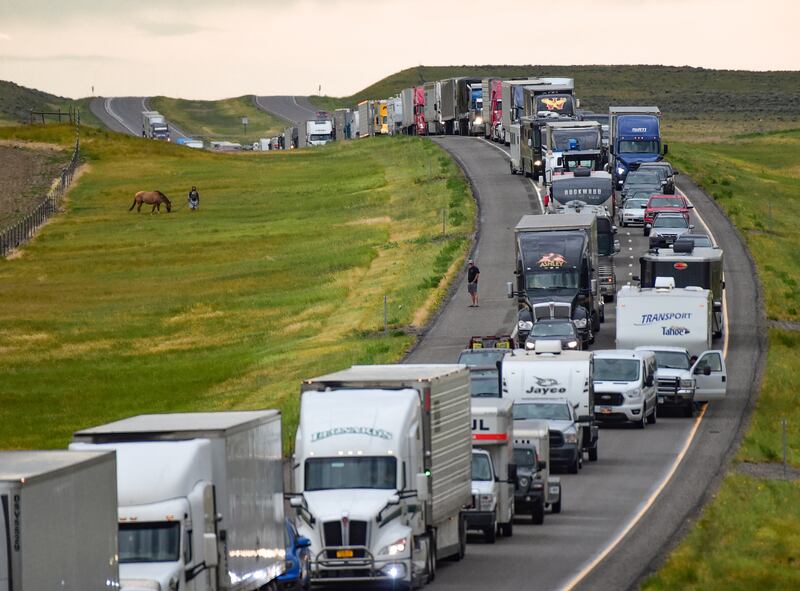 Hundreds of tractor-trailers, campers and cars were backed up for miles along the two eastbound lanes of the interstate. Photograph: Amy Lynn Nelson/Billings Gazette/AP