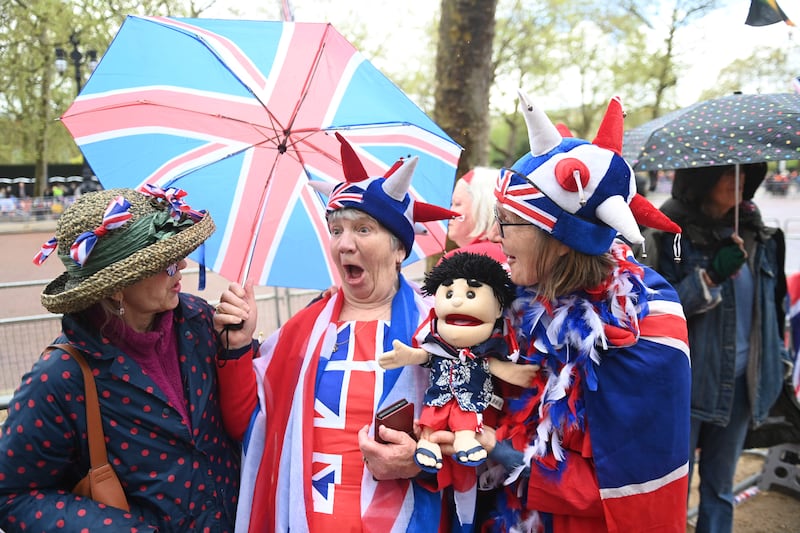 Royal fans wait on the coronation procession route on The Mall in London, Britain, May 5th 2023. Britain's King Charles III's coronation takes place at Westminster Abbey in London on Saturday.