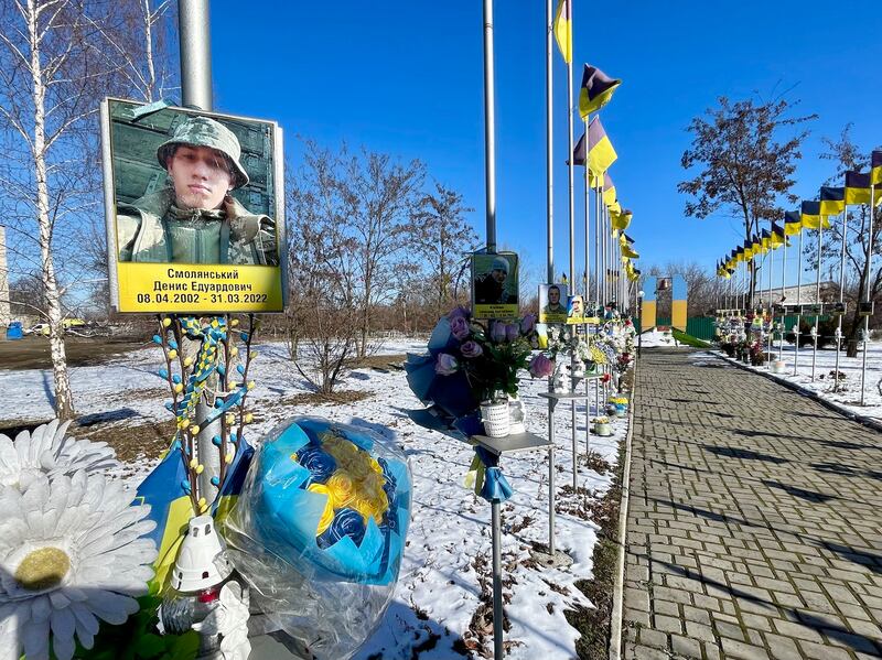 A memorial in Mezhova to 57 local men killed while serving in the Ukrainian army during 11 years of conflict with Russia. Photograph: Daniel McLaughlin