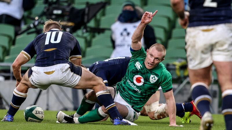 Keith Earls celebrates scoring a try against Scotland in December. Photograph: Dan Sheridan/Inpho