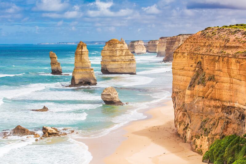 Twelve Apostles rock formations alongside Great Ocean Road in Victoria, Australia. Photograph: Greg Brave/Getty/iStock