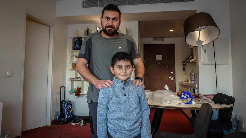 Adam Afana and his uncle Eid have been separated from the rest of their surviving family as he receives treatment in Lebanon. Photograph: Sally Hayden