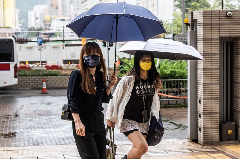 Former district councillor Clarisse Yeung (left) arrives at West Kowloon court in Hong Kong on June 14th last as her trial, along with that of 46 other pro-democracy activists, resumes. Photograph: Isaac Lawrence/AFP via Getty Images