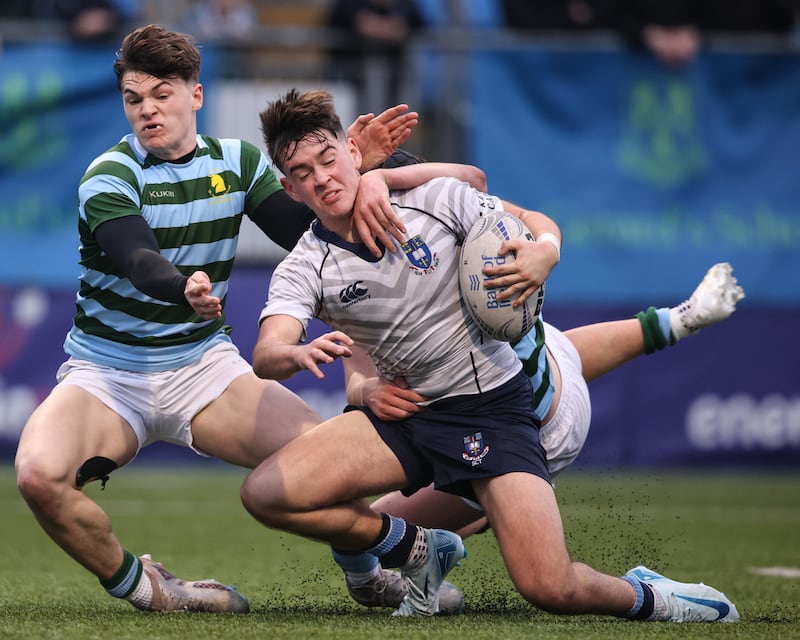 
St Gerards' Ronan Kelly and Ellian Desmond tackle Luke Kilmurray of St Michaels College during their Leinster Schools Senior Cup quarter-final at Energia Park. Photograph: Ben Brady/Inpho