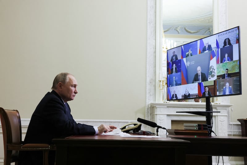 Vladimir Putin chairs a meeting with members of his government via videoconference, at the Constantine Palace in Strelna, St Petersburg, on Tuesday. Photograph: Mikhail Metzel/AFP via Getty Images 