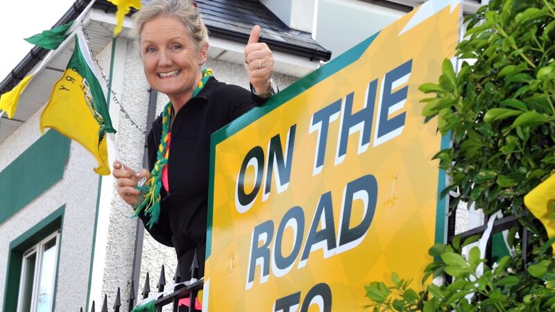 Mary O’Brien, mother of Kerry forward and player of the year contender Stephen, proudly displays the county colours at her home in Kenmare, Co Kerry.  Photo: Don MacMonagle