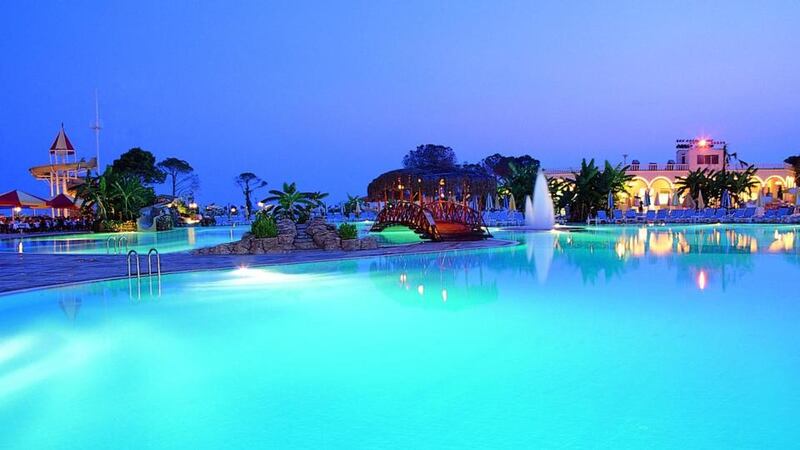 One of the resort’s pools at dusk