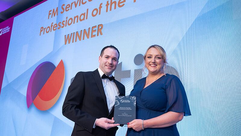 Martin McNally, head of smoke ventilation and service at Williaam Cox, presents the FM Service Provider Professional of the Year award to Kelly Hanley, Mitie Facilities Management.