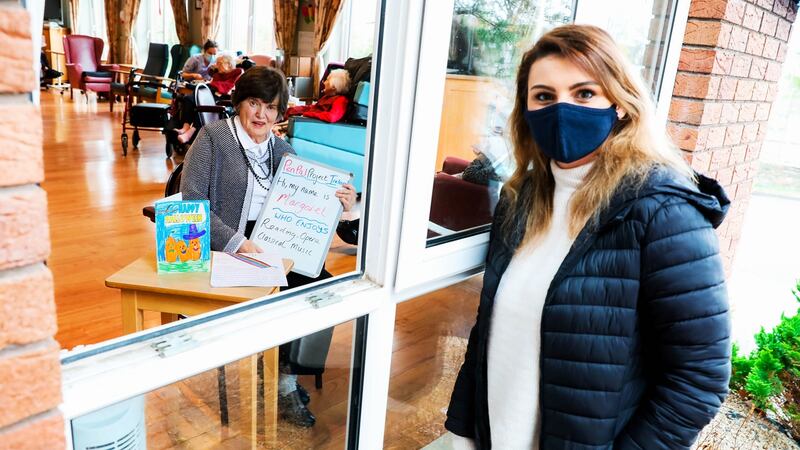 Stacey Fiat, who is behind the PenPal Ireland initiative  and Craddock House Nursing Home resident Margaret Dawson at the  nursing home in Naas, Co Kildare. Photograph: Aishling Conway