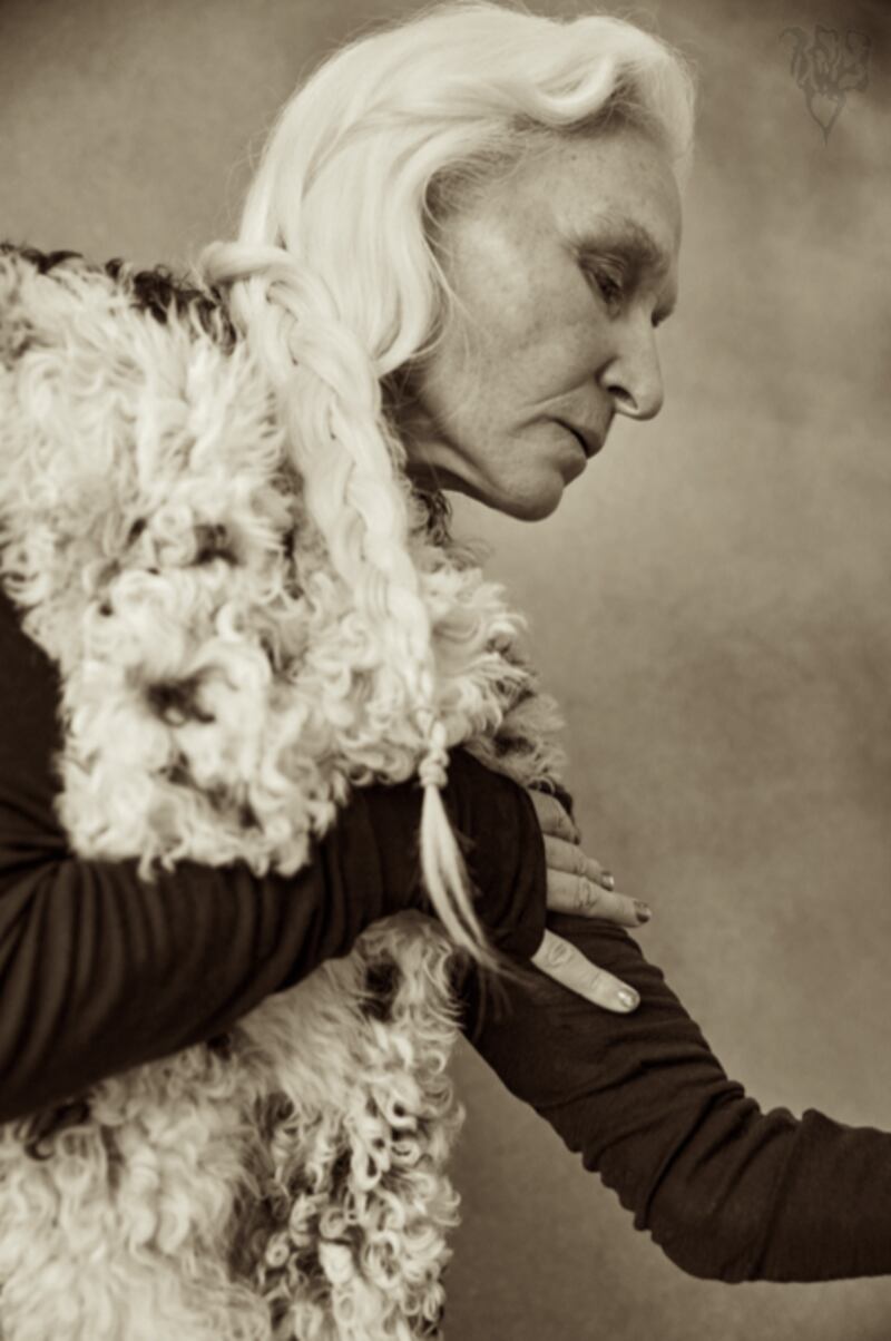 Undyed curly lambskin gilet with natural uncut edges, long gloves. Photograph: Eilish McCormick