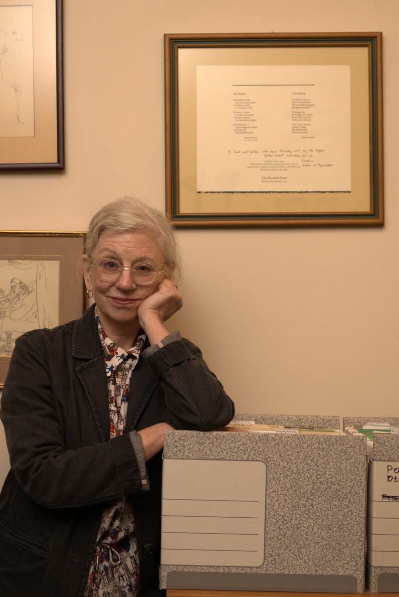 Alice Lyons with a framed copy of Mise Raifteirí, with a dedicated English translation by Seamus Heaney, in the former home of Polish writer Czeslaw Milosz. Photograph: Adrian Pallasch