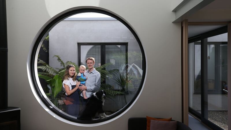 David Shannon and Susie Dillon with their daughter, Olive, and dog Bonnie at their home Fern Cottage, Shankill, Co Dublin. Photograph: Nick Bradshaw