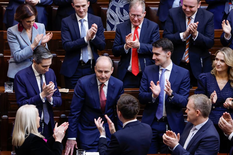 Taoiseach Micheál Martin receives a standing ovation from party and Government colleagues in the 34th Dáil following his election on Thursday. Photograph: Maxwell's/PA Wire