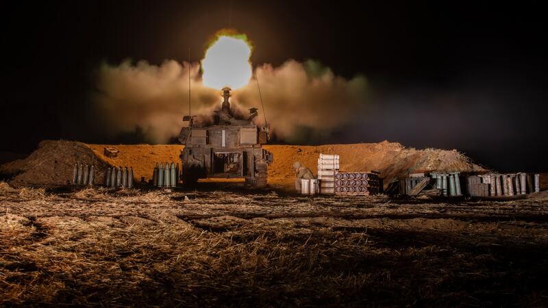 Israeli artillery fires into the Gaza Strip from the border on May 13th. Photograph:  Dan Balilty/The New York Times