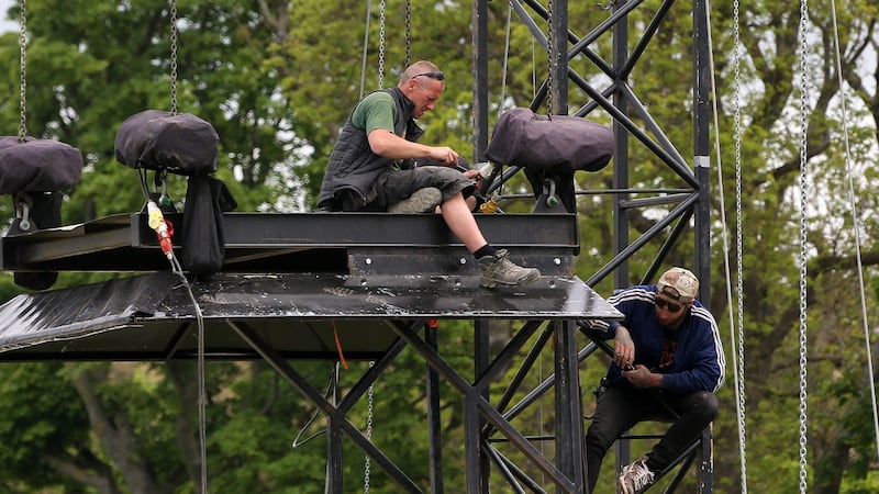 Workers prepare equipment at the auditorium for this week’s Ed Sheeran concerts in the Phoenix Park. Photograph: Colin Keegan/Collins Dublin