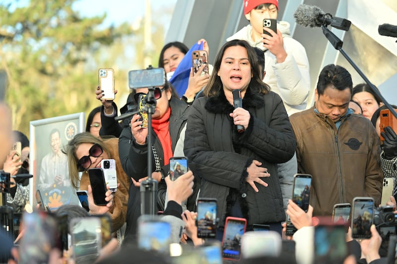 Philippines vice-president Sara Duterte addresses supporters of her father, former president Rodrigo Duterte, outside the International Criminal Court in The Hague on Friday. Photograph: Nicolas Tucat/AFP via Getty Images