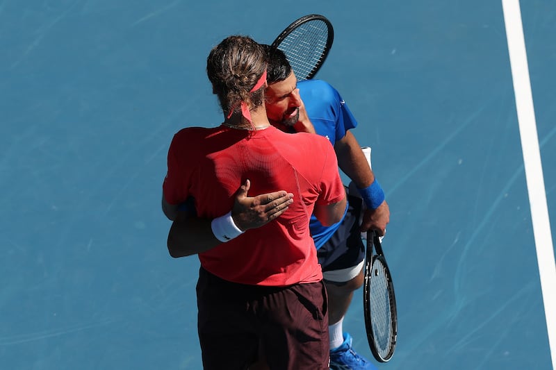 Novak Djokovic is embraced by Alexander Zverev after retiring from the men's singles semi-final during day 13 of the 2025 Australian Open. Photograph: Clive Brunskill/Getty Images