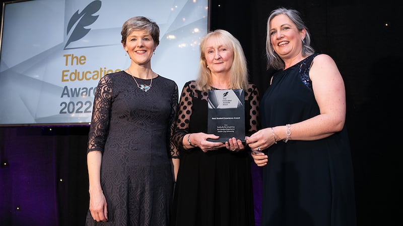 Colette Henry, Awards Judge, presents the Best Student Experience Award to Blanaid White and Susan Hegarty, Dublin City University.