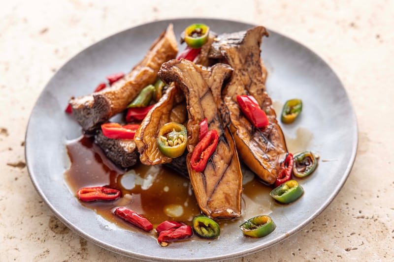 Pan fried king oyster mushrooms with soy, bonito vinegar and chilli. Photograph: Harry Weir Photography
